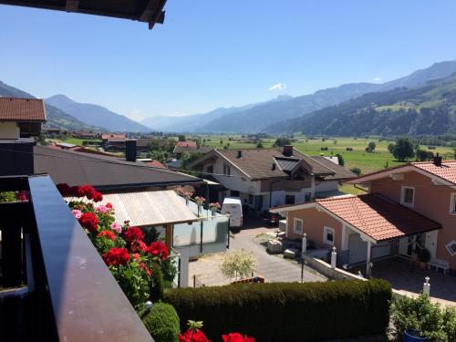 a view of a town with houses and flowers at Haus Deutinger in Piesendorf