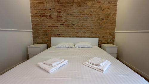 Katil atau katil-katil dalam bilik di Carol Residence - ultra central - powered by NEO