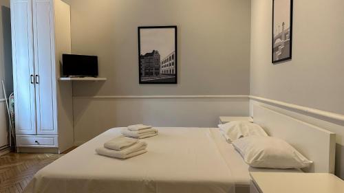 Katil atau katil-katil dalam bilik di Carol Residence - ultra central - powered by NEO
