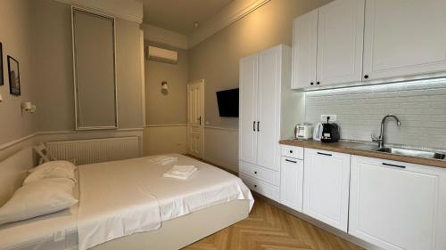 Dapur atau dapur kecil di Carol Residence - ultra central - powered by NEO