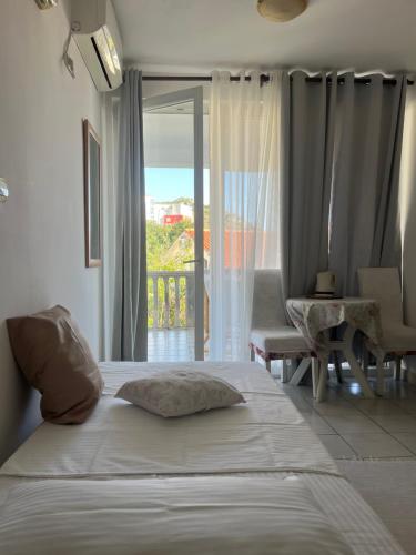 Postel nebo postele na pokoji v ubytování Apartments Kuljaca