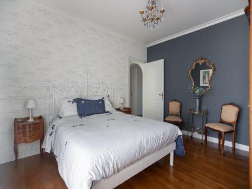 Ένα ή περισσότερα κρεβάτια σε δωμάτιο στο Quaint Holiday Home with Garden