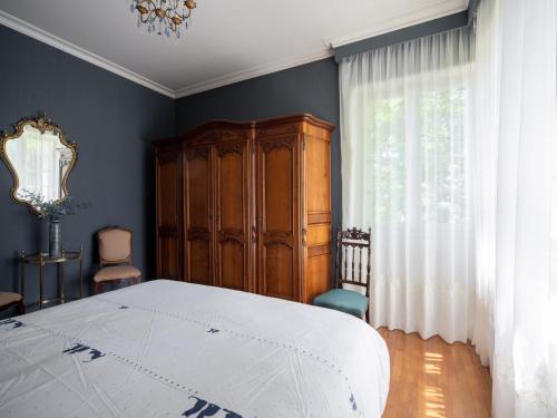 Ένα ή περισσότερα κρεβάτια σε δωμάτιο στο Quaint Holiday Home with Garden