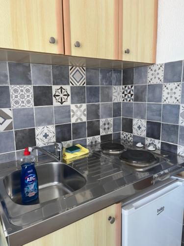 Kuchyň nebo kuchyňský kout v ubytování Apartments Kuljaca