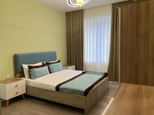 Ένα ή περισσότερα κρεβάτια σε δωμάτιο στο Green City Resort