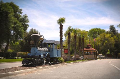 a small train sitting on the side of a street at Soledad Canyon Studio Cabin 19 in Ravenna