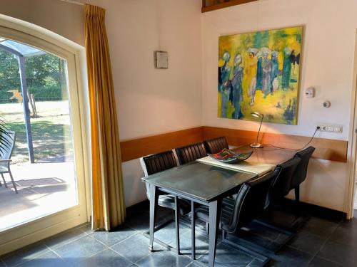 Φωτογραφία από το άλμπουμ του Coachman's House near Roermond with Garden σε Sint Odiliënberg