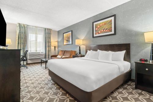 Ένα ή περισσότερα κρεβάτια σε δωμάτιο στο Comfort Inn Rehoboth Beach