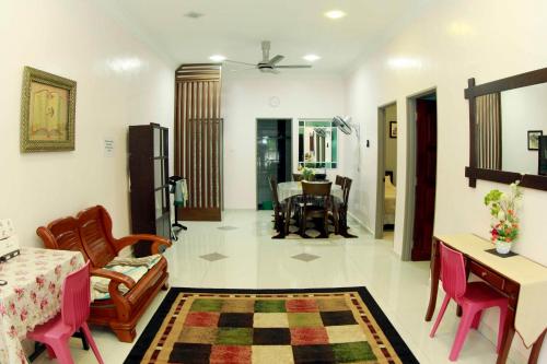 Χώρος καθιστικού στο Twin Castle Homestay Kuala Pilah