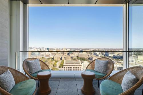 a room with chairs and a large window at Hyatt Centric Congress Avenue Austin in Austin