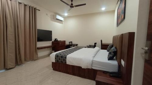 Televisyen dan/atau pusat hiburan di Savanna Retreat By Mystical Views