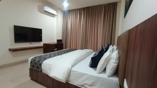 Katil atau katil-katil dalam bilik di Savanna Retreat By Mystical Views