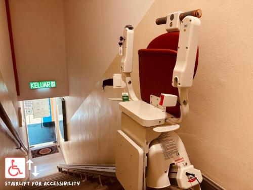 a dental examination machine in a hospital room at Stylish, Modern Room with City View, Oasis in Melaka