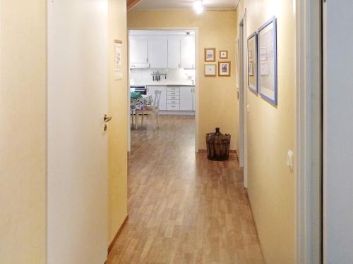 a hallway leading to a living room and a kitchen at 7 person holiday home in STRÅVALLA-By Traum in Löftabro
