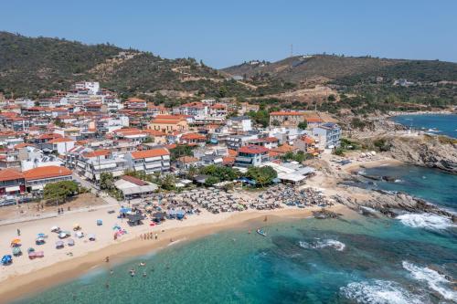 an aerial view of a beach in a town at BLUE HORIZON SARTI Oe in Sarti