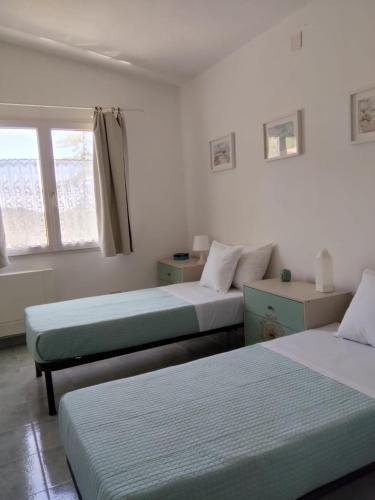 Ένα ή περισσότερα κρεβάτια σε δωμάτιο στο Villa Sofia