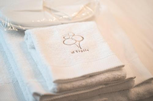 a pile of towels sitting on top of a table at IL Pollaio in Farra di Soligo