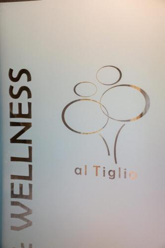 a book with the altecida logo on it at IL Pollaio in Farra di Soligo