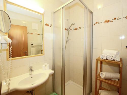a bathroom with a shower and a sink at Attractive holiday home in Kaltenbach on the ski-slope in Stumm