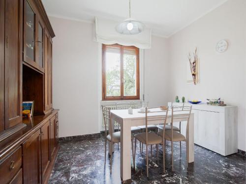 a kitchen with a table and chairs in a room at Holiday Home near Florence with Garden in Borgo San Lorenzo