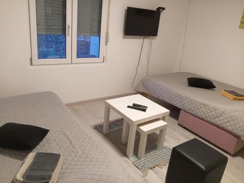 TV a/nebo společenská místnost v ubytování MaraHome