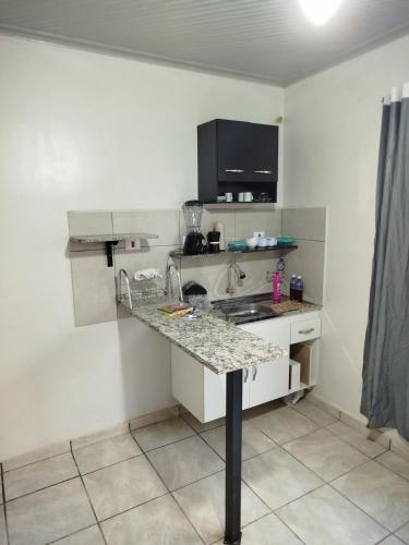 Køkken eller tekøkken på Apto 8 ótimo local próximo Shopping