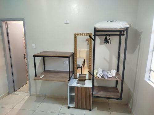 En eller flere senge i et værelse på Apto 8 ótimo local próximo Shopping