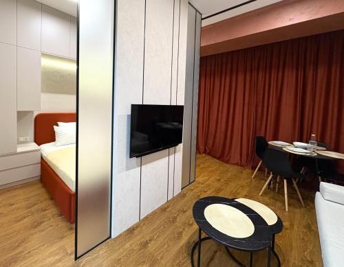 TV a/nebo společenská místnost v ubytování Siena Suite Tsaghkadzor