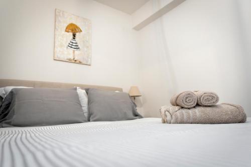 Ένα ή περισσότερα κρεβάτια σε δωμάτιο στο Aristotelous Forum Apartment - Thessaloniki Center