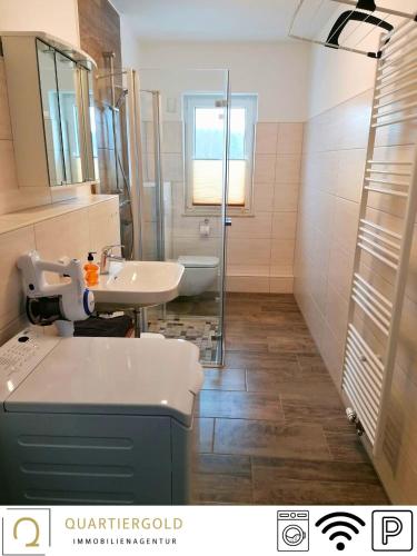 Koupelna v ubytování Monteurwohnung I bis zu 8 PAX