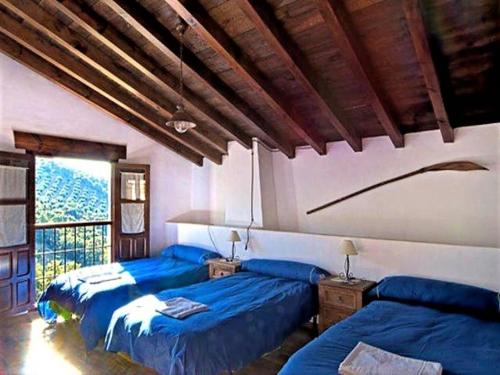 Ένα ή περισσότερα κρεβάτια σε δωμάτιο στο Beautiful holiday home in Andalusia with heated pool