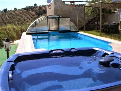Πισίνα στο ή κοντά στο Beautiful holiday home in Andalusia with heated pool
