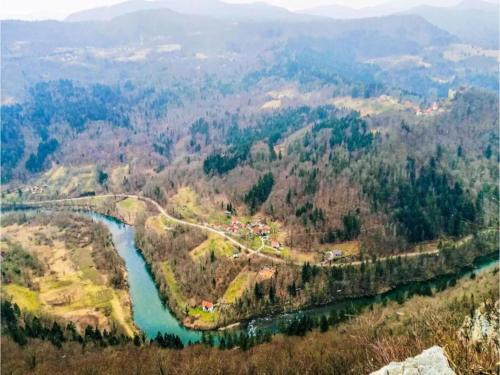 an aerial view of a river in a valley at Tranquil Holiday Home in Kvarner near Kupa River in Brod Moravice