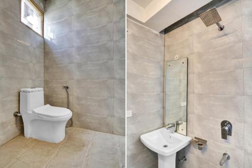 a bathroom with a toilet and a sink at Collection O The Miscue in Gurgaon