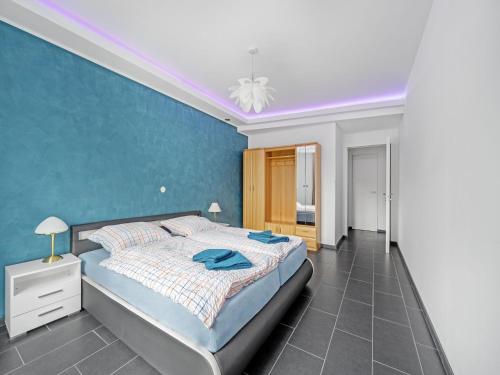Postel nebo postele na pokoji v ubytování Pleasant apartment in Herscheid-Sauerland with balcony