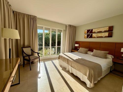 Postel nebo postele na pokoji v ubytování Suite de lujo Alanda Club Marbella