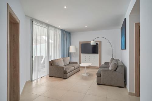 TV a/nebo společenská místnost v ubytování Radisson Blu Resort & Spa, Gran Canaria Mogan