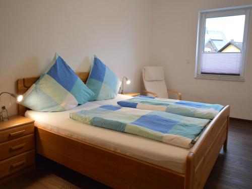 Una cama o camas en una habitación de Dreamy Holiday Home in Ellscheid with Terrace