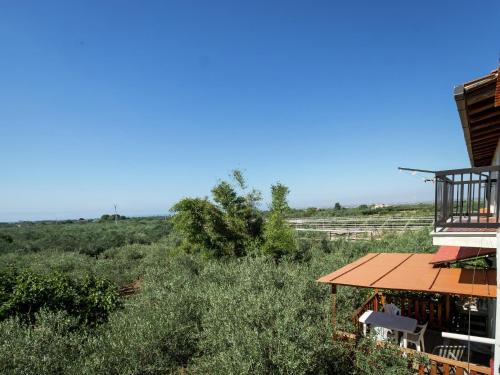 a building with a view of a field at Holiday Home in Sciacca with Garden, Swimming Pool, Parking in Cartabubbo