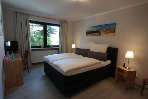 Postel nebo postele na pokoji v ubytování Hotel Lindas
