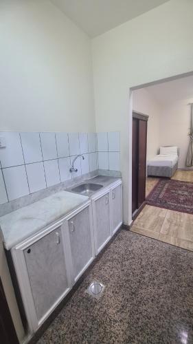 Postel nebo postele na pokoji v ubytování فندق منار الشروق