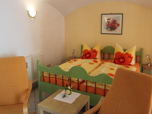 Ένα ή περισσότερα κρεβάτια σε δωμάτιο στο Cosy Apartment in Weißig with Garden