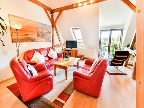 Un lugar para sentarse en Fabelhaftes Ferienhaus in Thorstorf in Meeresnaehe