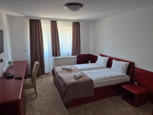 Postel nebo postele na pokoji v ubytování Divski Wellness Resort
