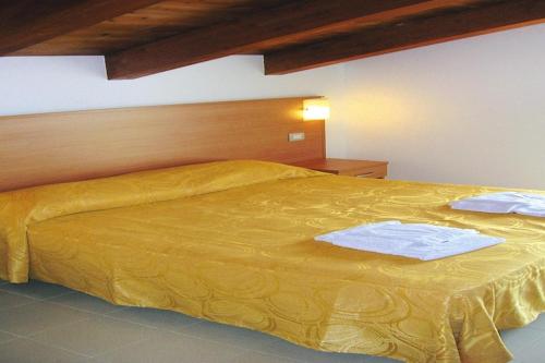 Ένα ή περισσότερα κρεβάτια σε δωμάτιο στο Apartment in Roseto Degli Abruzzi
