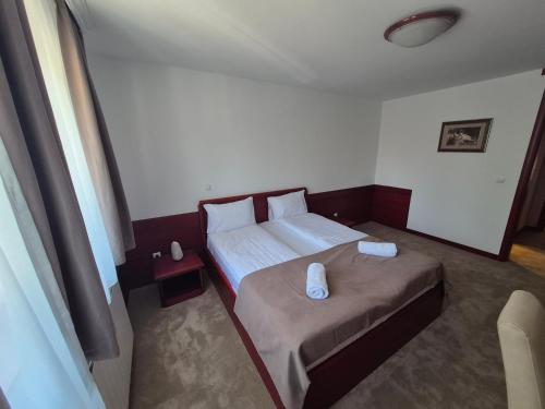 Postel nebo postele na pokoji v ubytování Divski Wellness Resort