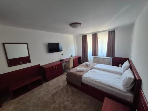 Postel nebo postele na pokoji v ubytování Divski Wellness Resort