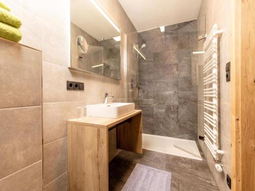 a bathroom with a sink and a shower at Apartment in Strass im Zillertal in a beautiful setting in Strass im Zillertal