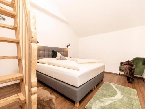 a bedroom with a bunk bed and a ladder at Apartment in Strass im Zillertal in a beautiful setting in Strass im Zillertal