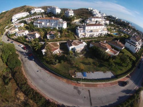 an aerial view of a house on a hill at Villa Carmen in Torrox Costa